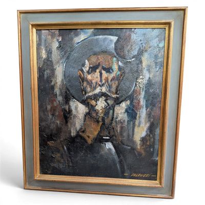 tableau représentant un homme portant un chapeau et une barbe, dans un cadre doré