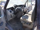 a car that has a steering wheel and a seat in it
