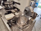 an image of a kitchen with a mixer and other appliances
