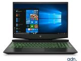 un ordinateur portable sur lequel est posé un clavier vert