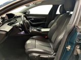 the interior of a car with the door open and the seats down