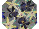 a picture of a blue and yellow umbrella with flowers on it