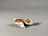a piece of pizza that has been left on the table
