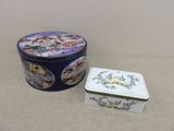 two tins that are sitting next to each other on a table