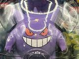 a purple toy with a crown on top of it
