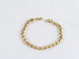 le bracelet en perles d'or