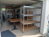 a garage with a lot of shelves in it