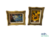 two framed pictures of sunflowers in a vase and a vase of flowers