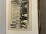 a book with a picture of a group of people on it
