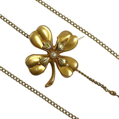 Ensemble en or 750/1000 comprenant BROCHE "Trèfle" avec perl… - Photo 1