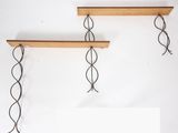 two wooden shelves that have wires attached to them