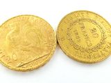 deux pièces d'or sur lesquelles figurent respectivement l'effigie d'une femme et celle d'un homme