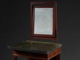 a small table with a mirror on top of it