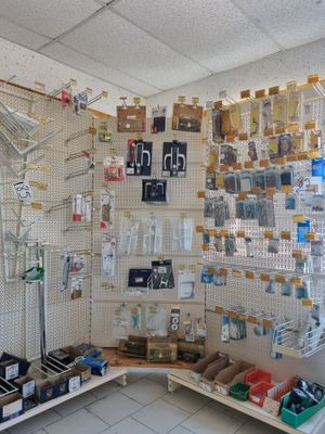 a room with many items on the shelves in it