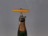 a bottle of champagne with a cork on top of it
