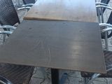 a table and chairs that are outside on the patio