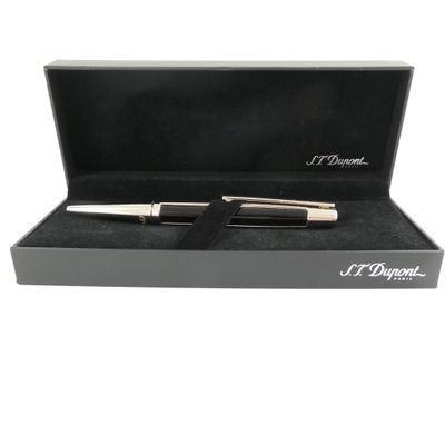 an image of a pen in a black box on a white background