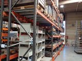 a large warehouse filled with lots of shelves and pallets