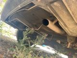 a close up of a car with a exhaust pipe on it