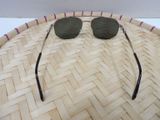 a close up of a pair of sunglasses on a basket