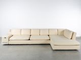 an image of a white leather sectional couch with a chaise