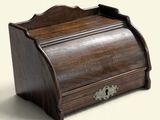 an image of a wooden box with a metal handle on a white background