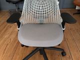 a chair that is sitting on a hard wood floor