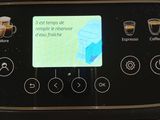 a coffee machine that has a menu on the screen