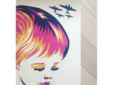 a poster of a young child with a plane in the background