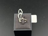 an image of a gold ring on top of a black box
