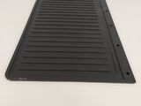 a close up of a black tray on a white surface