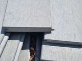 a close up of a roof with a flat roof and a flat roof