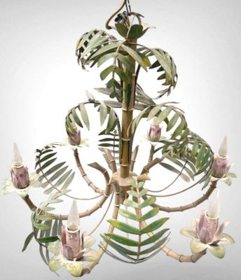 a chandelier that has a bunch of flowers on it