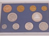 an image of a display case with a variety of coins in it