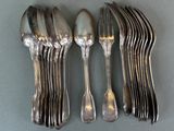six spoons and six forks on the table