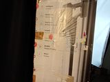 a picture of a picture of a desk with a roll up banner