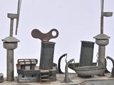a model of a boat with a flag on top of it