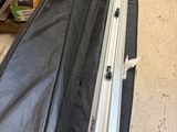 a suitcase that is sitting on the floor next to a pallet