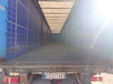 the back end of a truck with a license plate on the back of it