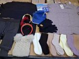 many items that are sitting on a pallet on the floor