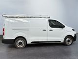 a white van that is parked in a parking lot