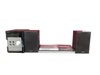 une chaîne hi-fi équipée d'enceintes et d'un lecteur CD