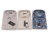 three men ' s dress shirts are lined up on a white surface