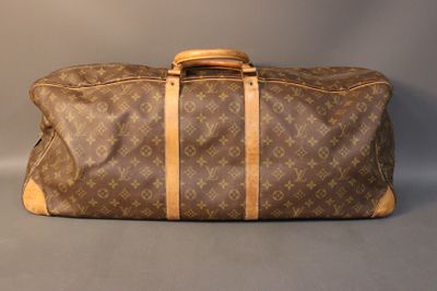 louis vuitton monogram canvas and leather duffle bag