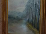 a picture of a painting hanging on the wall