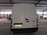 a white van that is parked in a parking lot