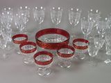 bottles and glasses are arranged in a circle on a table