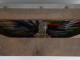 a picture of a piece of art hanging from the ceiling