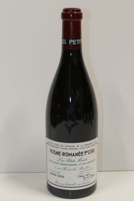 a bottle of wine that is sitting on a table