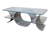 une table basse en verre avec des pieds en métal et un plateau en verre